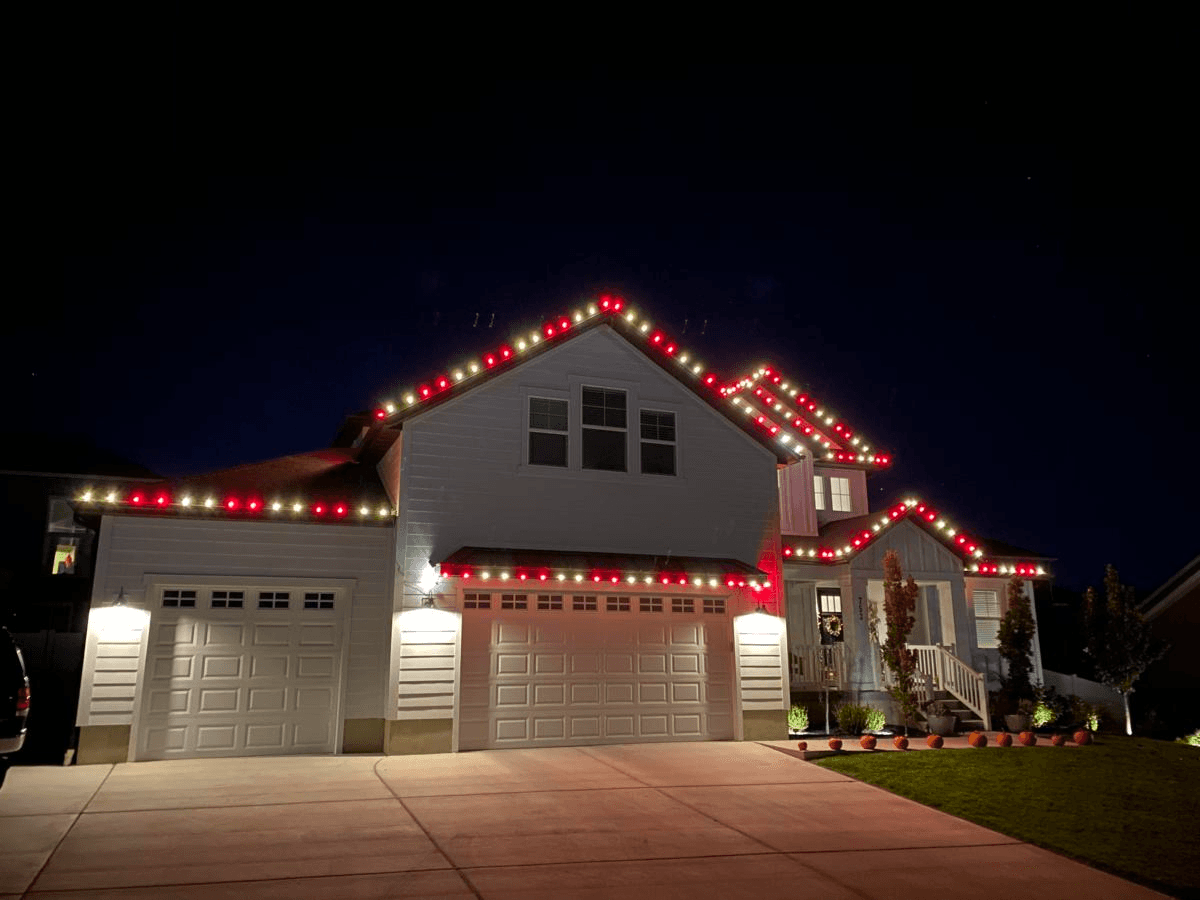 Home lit with Red + Warm White Christmas lights